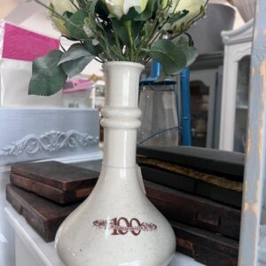 11. Pottery Vase with artificial flowers